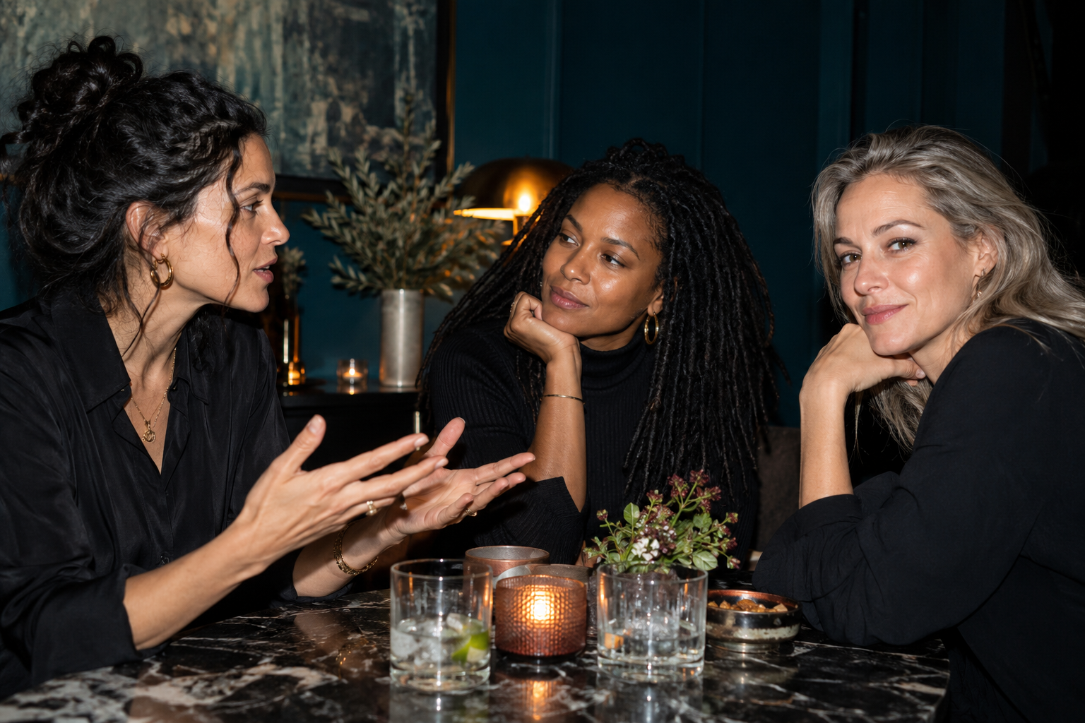 Women listening and talking together around a table